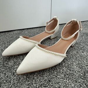 Lulu’s wedding shoes never worn. Size 10